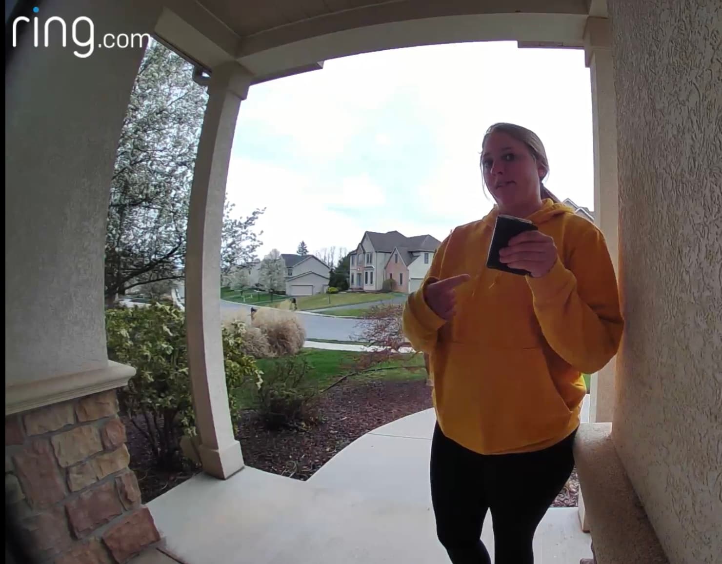 The same Ring doorbell still, now unblurred, revealing Brooke Dubs